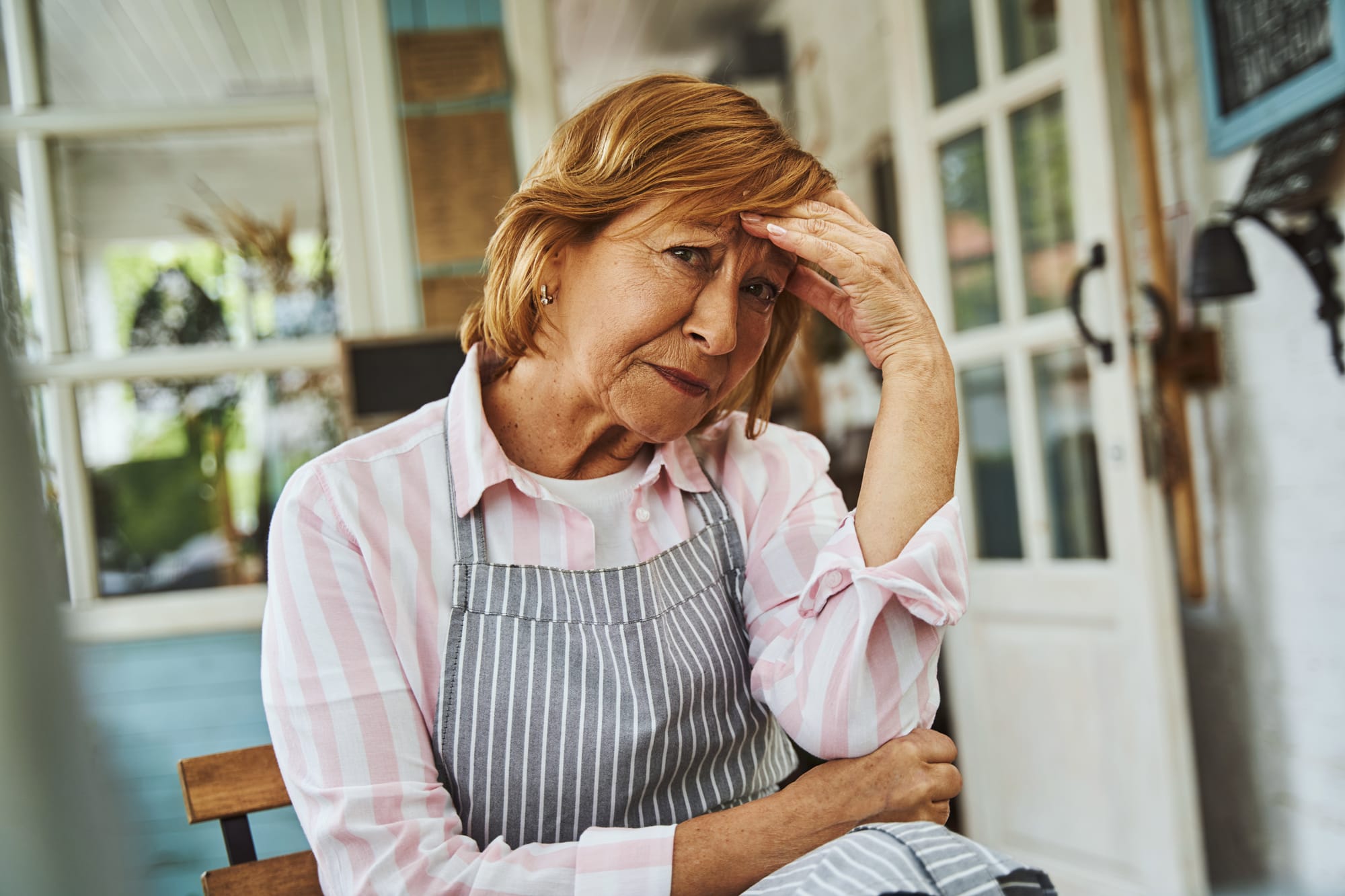 a worried woman concerned about the future