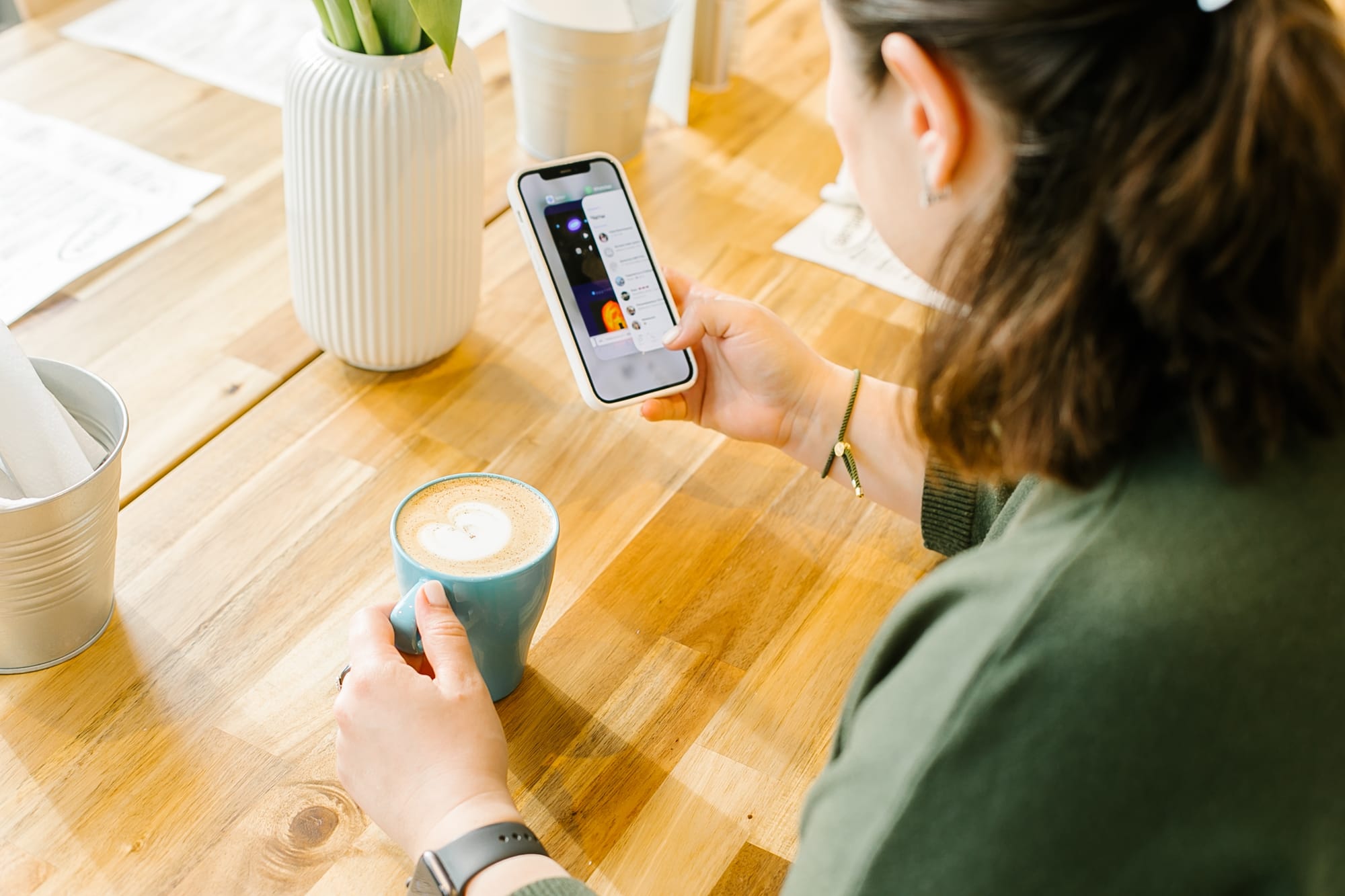 a woman browsing apps on her phone