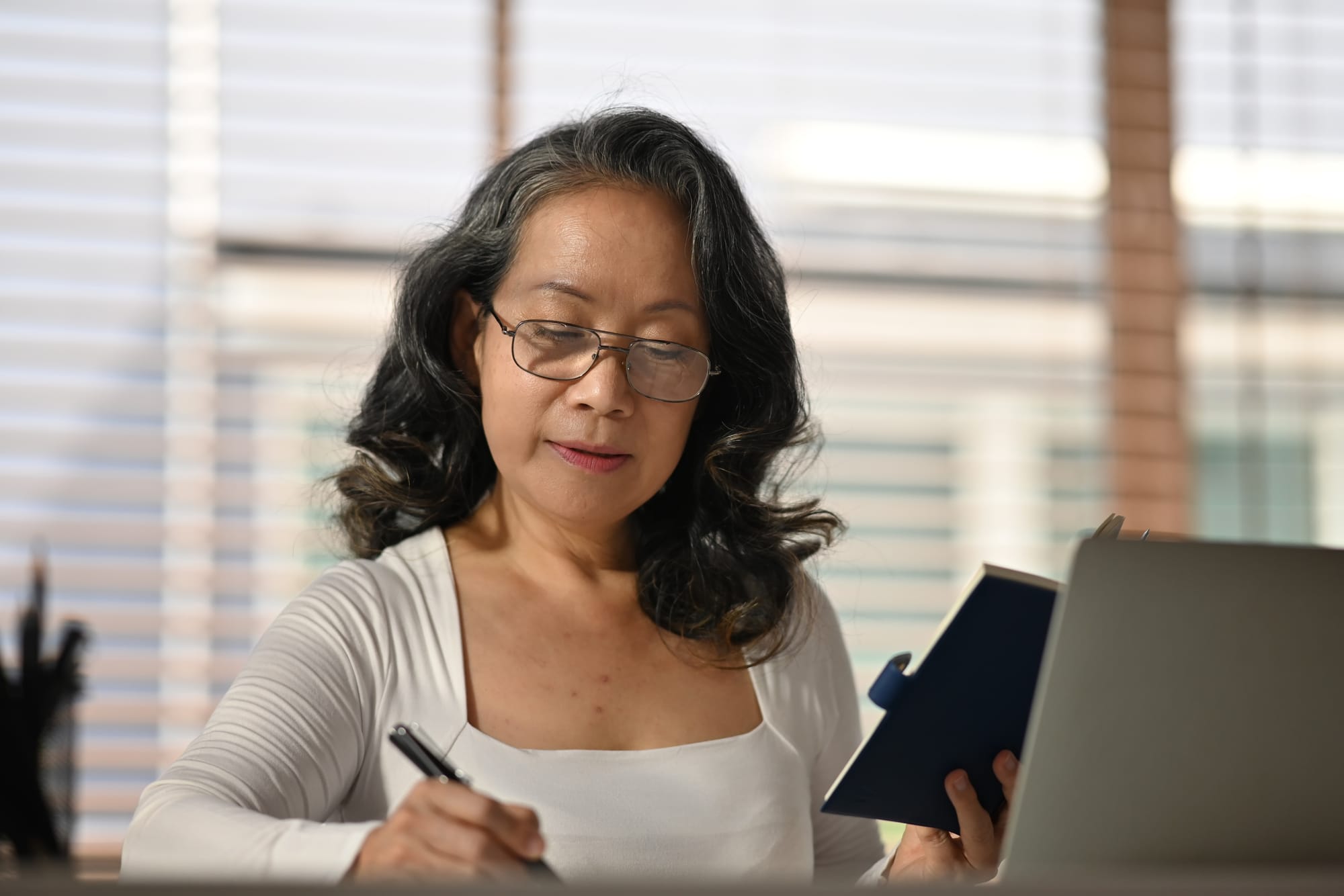 a woman checking credentials for a caregiver