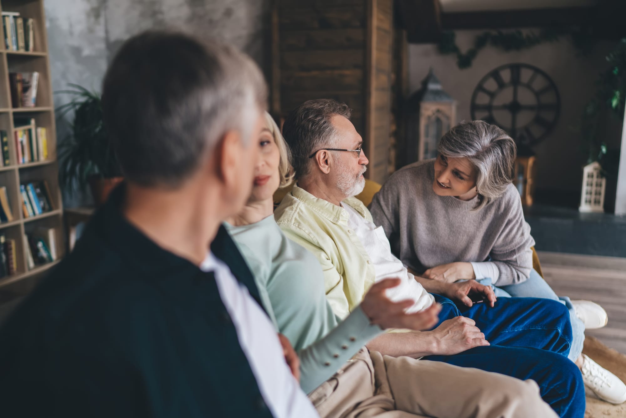 older people having fun on a couch