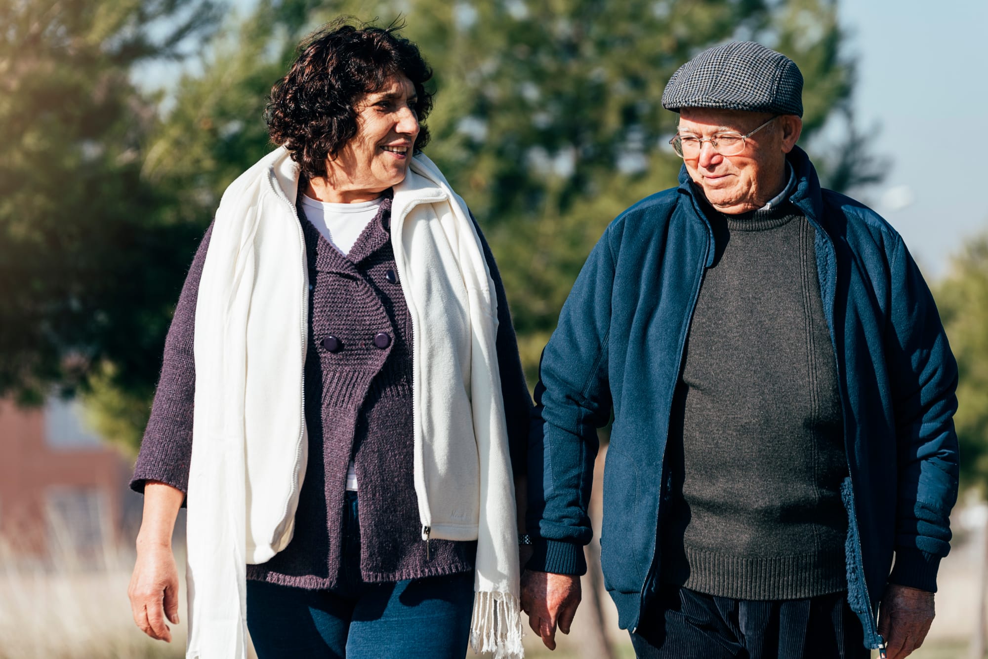 an older couple with alzheimers walking