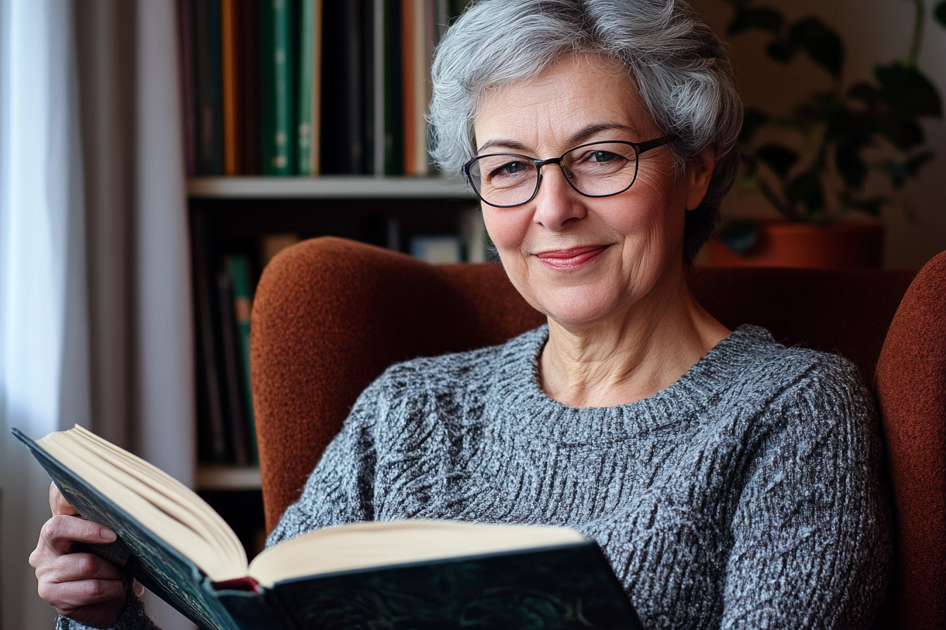 an elderly woman reading a book