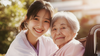 a smiling caregiver and an older adult