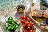 Mediterranean Diet For Longevity and Blue Zones Visual with Tomatoes, Basil, Olives, Salmon